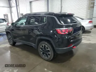 2019 Jeep Compass Trailhawk with VIN 3C4NJDDB4KT647187, listed as a Copart auction lot 50260575 with 63,098 mi miles and Salvage Title. Bid and sale history available at carsss.com. Image 2.