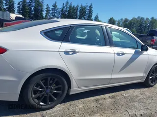 2017 Ford Fusion SE z VIN 3FA6P0HD3HR132779, wystawiony jako IAAI lot #42690212 z przebiegiem 165 293 mil mil oraz . Historia ofert i sprzedaży dostępna na DreamBid. Obrazek 13.