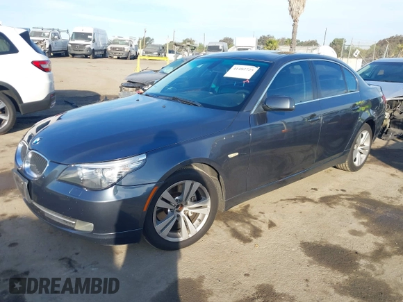 2009 BMW 5 Series 528i with VIN WBANU53519C118596, listed as a IAAI auction lot 41482725 with 130,975 mi miles and . Bid and sale history available at carsss.com. Image 2.