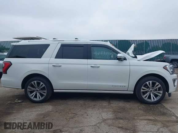2020 Ford Expedition Max Platinum z VIN 1FMJK1MT1LEB00801, wystawiony jako IAAI lot #42441525 z przebiegiem 40 193 mil mil oraz . Historia ofert i sprzedaży dostępna na DreamBid. Obrazek 13.