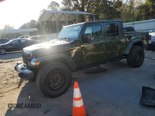 2021 Jeep Gladiator Freedom с VIN 1C6HJTAG8ML592059, выставлен на аукционе Copart как лот 50199455 с пробегом 59 677 миль миль и Списание • Salvage title. История ставок и продаж доступна на DreamBid. Изображение 1.