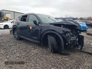 2018 Mazda CX-5 Grand Touring z VIN JM3KFBDM0J0403095, wystawiony jako Copart lot #48594495 z przebiegiem Nie podano mil oraz Szkoda całkowita • Salvage title. Historia ofert i sprzedaży dostępna na DreamBid. Obrazek 4.