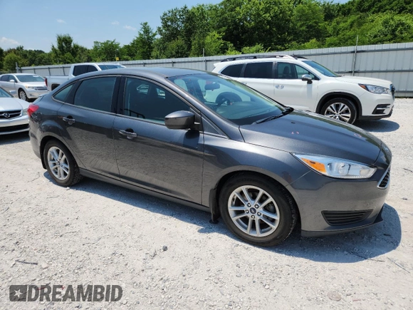 2018 Ford Focus SE with VIN 1FADP3F25JL331038, listed as a Copart auction lot 60235395 with 37,038 mi miles and Salvage title. Bid and sale history available at DreamBid. Image 4.