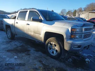 2015 Chevrolet Silverado 1500 LT with VIN 3GCUKREC8FG406809, listed as a IAAI auction lot 41352465 with 128,197 mi miles. Bid and sale history available at carsss.com. Image 1.