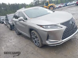 2020 Lexus RX 350 z VIN 2T2HZMAA7LC160132, wystawiony jako IAAI lot #41935300 z przebiegiem 60 723 mil mil oraz . Historia ofert i sprzedaży dostępna na DreamBid. Obrazek 1.