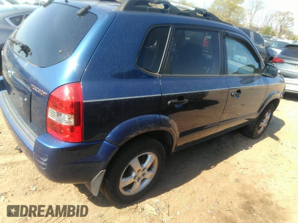2006 Hyundai Tucson GL with VIN KM8JM12B46U402808, listed as a IAAI auction lot 41902007 with 127,432 mi miles. Bid and sale history available at carsss.com. Image 4.