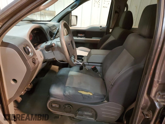 2007 Ford F-150 XLT with VIN 1FTRW02W07KA94452, listed as a Copart auction lot 47552485 with 335,643 mi miles and Salvage title. Bid and sale history available at DreamBid. Image 7.