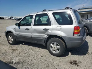 2002 Ford Escape XLS Choice with VIN 1FMYU02112KB00947, listed as a Copart auction lot 48948855 with 223,287 mi miles and Salvage title. Bid and sale history available at DreamBid. Image 2.