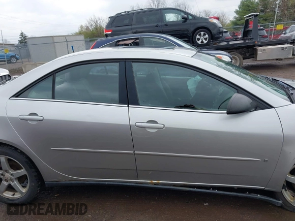 2006 Pontiac G6 6-Cyl with VIN 1G2ZG558464289212, listed as a IAAI auction lot 41994843 with 126,502 mi miles. Bid and sale history available at carsss.com. Image 13.