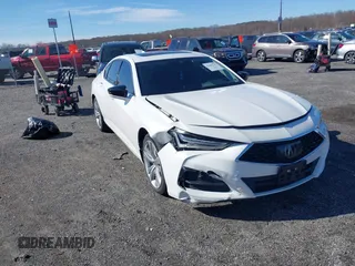 2021 Acura TLX Technology z VIN 19UUB6F41MA006805, wystawiony jako IAAI lot #41869747 z przebiegiem 59 228 mil mil oraz . Historia ofert i sprzedaży dostępna na DreamBid. Obrazek 1.