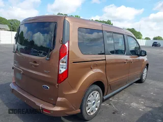2014 Ford Transit Connect XLT with VIN NM0GS9F7XE1141576, listed as a IAAI auction lot 42458602 with 196,654 mi miles and . Bid and sale history available at DreamBid. Image 4.