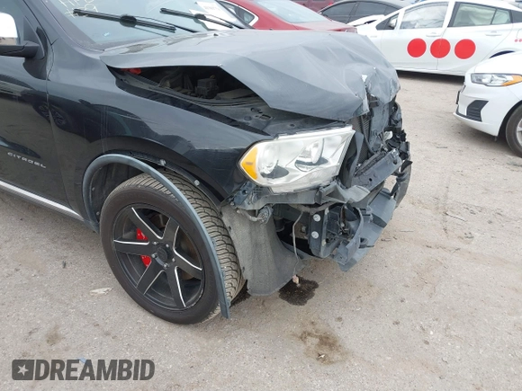 2011 Dodge Durango Citadel with VIN 1D4SE5GTXBC695700, listed as a IAAI auction lot 41381731 with 152,055 mi miles. Bid and sale history available at carsss.com. Image 17.