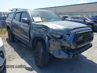 2019 Toyota Tacoma SR z VIN 3TMCZ5AN1KM267271, wystawiony jako IAAI lot #42034563 z przebiegiem 55 850 mil mil oraz . Historia ofert i sprzedaży dostępna na DreamBid. Obrazek 1.