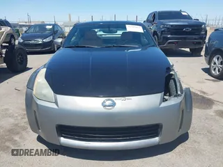 2004 Nissan 350Z Enthusiast z VIN JN1AZ34D74T164233, wystawiony jako IAAI lot #42509421 z przebiegiem 90 780 mil mil oraz . Historia ofert i sprzedaży dostępna na DreamBid. Obrazek 13.