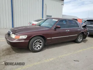 2001 Mercury Grand Marquis LS z VIN 2MEFM75WX1X657930, wystawiony jako Copart lot #52380475 z przebiegiem 158 910 mil mil oraz Szkoda całkowita • Salvage title. Historia ofert i sprzedaży dostępna na DreamBid. Obrazek 1.