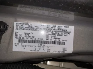 2015 Ford Focus SE with VIN 1FADP3F21FL376579, listed as a IAAI auction lot 41972088 with 129,593 mi miles. Bid and sale history available at carsss.com. Image 9.