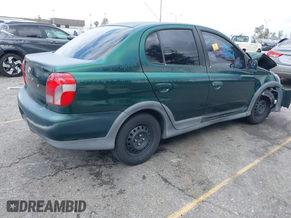 2001 Toyota ECHO with VIN JTDBT123310107980, listed as a IAAI auction lot 42131638 with Not Provided miles and . Bid and sale history available at DreamBid. Image 4.