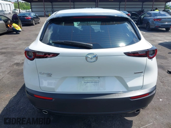 2024 Mazda CX-30 S z VIN 3MVDMBAM6RM615440, wystawiony jako IAAI lot #42265517 z przebiegiem 11 826 mil mil oraz . Historia ofert i sprzedaży dostępna na DreamBid. Obrazek 16.