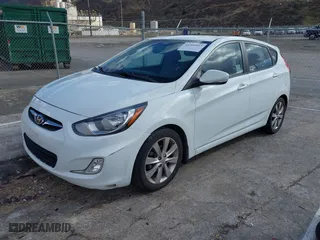 2013 Hyundai Accent SE with VIN KMHCU5AE6DU079600, listed as a IAAI auction lot 41569913 with 126,764 mi miles. Bid and sale history available at carsss.com. Image 17.