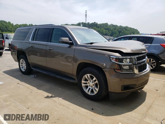 2015 Chevrolet Suburban LS with VIN 1GNSCHKC8FR628406, listed as a Copart auction lot 60682805 with 195,151 mi miles and Salvage title. Bid and sale history available at DreamBid. Image 4.