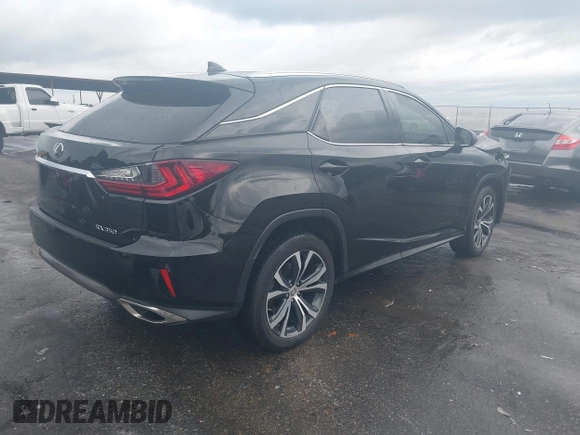 2017 Lexus RX 350 with VIN 2T2ZZMCA9HC054239, listed as a IAAI auction lot 42449544 with 49,472 mi miles and . Bid and sale history available at DreamBid. Image 4.