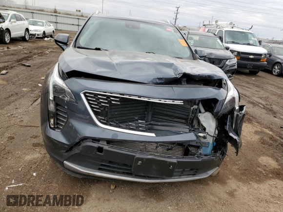 2020 Cadillac XT4 FWD Premium Luxury z VIN 1GYFZCR43LF050118, wystawiony jako Copart lot #49529635 z przebiegiem 93 290 mil mil oraz Tytuł czysty. Historia ofert i sprzedaży dostępna na DreamBid. Obrazek 5.