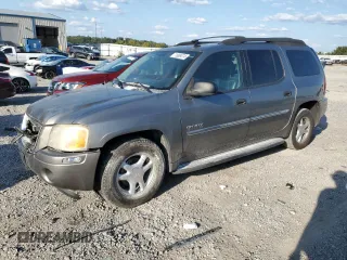 2006 GMC Envoy SLE with VIN 1GKET16S766147308, listed as a Copart auction lot 71669374 with 237,254 mi miles and Salvage Title. Bid and sale history available at DreamBid. Image 1.