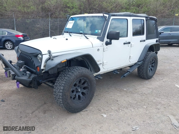 2012 Jeep Wrangler Unlimited Sahara with VIN 1C4BJWEG9CL220965, listed as a IAAI auction lot 41902295 with 120,492 mi miles. Bid and sale history available at carsss.com. Image 18.