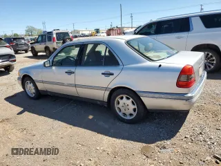 1995 Mercedes-Benz C with VIN WDBHA28E7SF255142, listed as a Copart auction lot 68411704 with 334,000 mi miles and Salvage Title. Bid and sale history available at carsss.com. Image 2.
