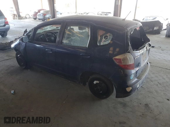 2009 Honda Fit with VIN JHMGE872X9S036722, listed as a Copart auction lot 64701315 with 197,305 mi miles and Non repairable. Bid and sale history available at DreamBid. Image 2.