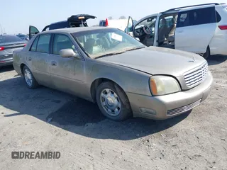 2004 Cadillac DeVille z VIN 1G6KD57Y14U122812, wystawiony jako IAAI lot #41785554 z przebiegiem 259 003 mil mil oraz . Historia ofert i sprzedaży dostępna na DreamBid. Obrazek 1.