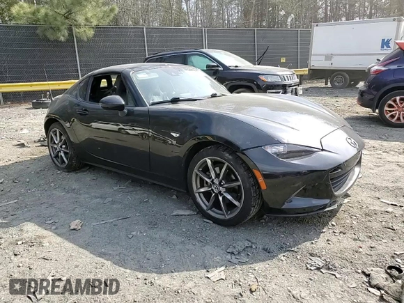2021 Mazda MX-5 Miata Grand Touring with VIN JM1NDAM71M0451354, listed as a Copart auction lot 47756025 with 53,347 mi miles and Salvage title. Bid and sale history available at DreamBid. Image 11.