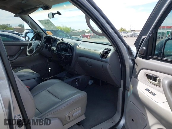 2002 Toyota Sequoia SR5 with VIN 5TDZT34A32S113234, listed as a IAAI auction lot 42086627 with 282,821 mi miles and . Bid and sale history available at carsss.com. Image 5.