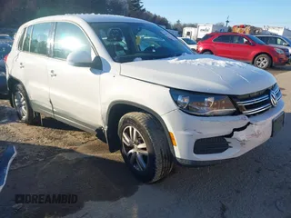 2013 Volkswagen Tiguan SE z VIN WVGBV3AX3DW608410, wystawiony jako IAAI lot #41397876 z przebiegiem 119 867 mil mil oraz . Historia ofert i sprzedaży dostępna na DreamBid. Obrazek 1.