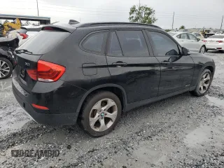 2014 BMW X1 sDrive28i z VIN WBAVM1C58EVW54632, wystawiony jako Copart lot #59796185 z przebiegiem 183 305 mil mil oraz Tytuł czysty. Historia ofert i sprzedaży dostępna na DreamBid. Obrazek 3.