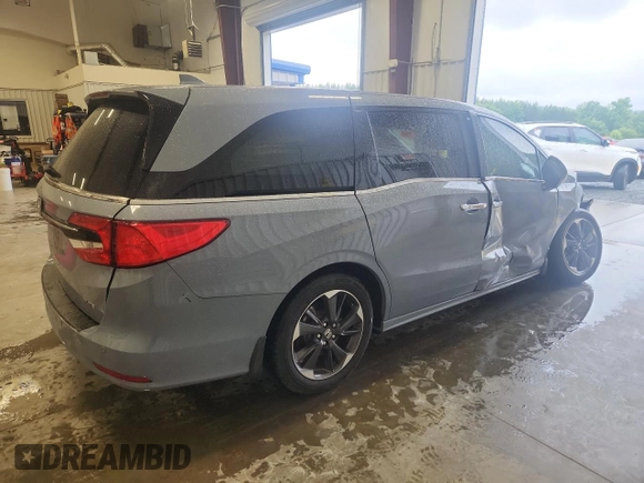 2023 Honda Odyssey Elite with VIN 5FNRL6H90PB071988, listed as a Copart auction lot 58589585 with 12,998 mi miles and Salvage title. Bid and sale history available at DreamBid. Image 3.