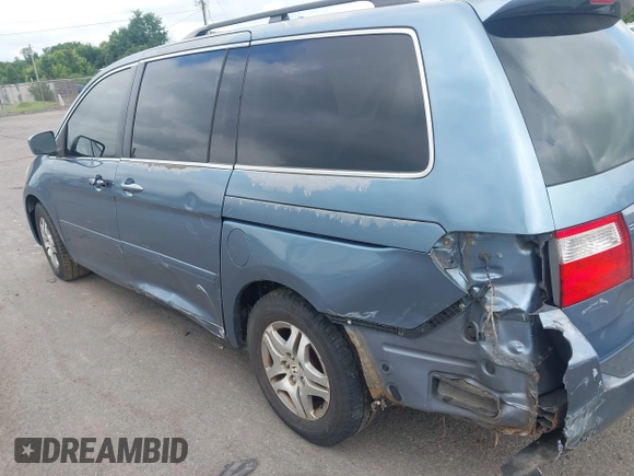 2005 Honda Odyssey EX with VIN 5FNRL38435B101887, listed as a IAAI auction lot 42704893 with 185,137 mi miles and . Bid and sale history available at DreamBid. Image 6.