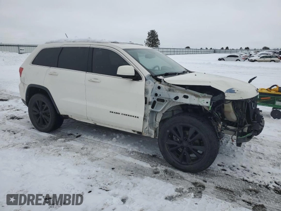 2012 Jeep Grand Cherokee Laredo with VIN 1C4RJFAT4CC335104, listed as a Copart auction lot 45306185 with 120,086 mi miles and Salvage Title. Bid and sale history available at carsss.com. Image 4.