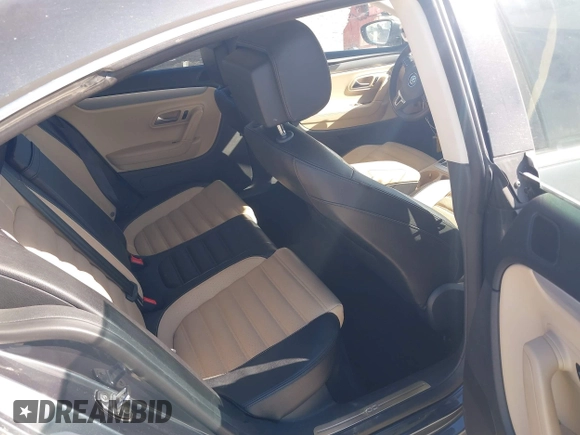 2013 Volkswagen CC Sport with VIN WVWBN7AN0DE551132, listed as a IAAI auction lot 41849514 with 144,557 mi miles. Bid and sale history available at carsss.com. Image 8.