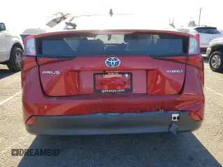2021 Toyota Prius L Eco with VIN JTDKAMFUXM3148409, listed as a Copart auction lot 83393084 with 72,241 mi miles and Clean Title. Bid and sale history available at carsss.com. Image 6.