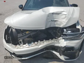 2023 Volkswagen Tiguan SE R-Line Black z VIN 3VVCB7AX0PM006045, wystawiony jako Copart lot #59591775 z przebiegiem 44 155 mil mil oraz Szkoda całkowita • Salvage title. Historia ofert i sprzedaży dostępna na DreamBid. Obrazek 12.
