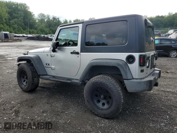 2007 Jeep Wrangler X with VIN 1J4FA24117L202404, listed as a Copart auction lot 58690485 with 126,347 mi miles and Salvage title. Bid and sale history available at DreamBid. Image 2.