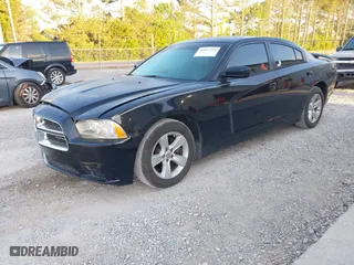 2012 Dodge Charger SE with VIN 2C3CDXBG7CH300367, listed as a IAAI auction lot 42067391 with 165,383 mi miles. Bid and sale history available at carsss.com. Image 2.