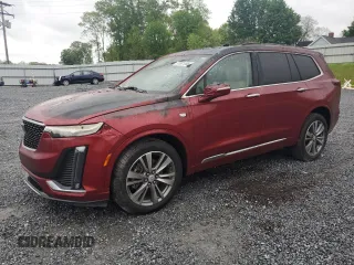 2021 Cadillac XT6 Premium Luxury with VIN 1GYKPDRSXMZ231922, listed as a Copart auction lot 51981065 with 16,784 mi miles and Salvage Title. Bid and sale history available at carsss.com. Image 1.