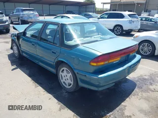1995 Saturn SL with VIN 1G8ZK5275SZ303745, listed as a IAAI auction lot 42280801 with 137,719 mi miles and . Bid and sale history available at DreamBid. Image 3.