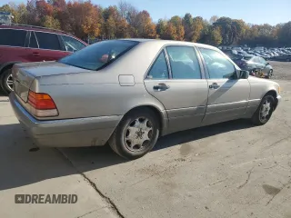 1995 Mercedes-Benz S 320 with VIN WDBGA32E6SA256435, listed as a Copart auction lot 77104234 with 309,498 mi miles and Clean Title. Bid and sale history available at DreamBid. Image 3.