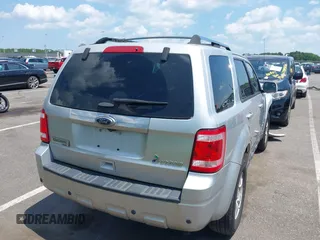 2011 Ford Escape Hybrid with VIN 1FMCU5K39BKB43196, listed as a IAAI auction lot 42558830 with 132,795 mi miles and . Bid and sale history available at DreamBid. Image 4.