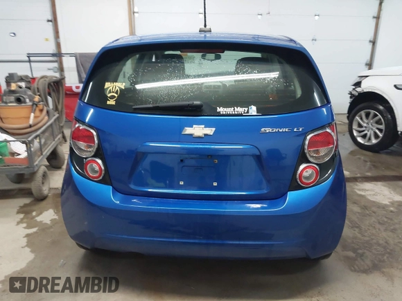 2016 Chevrolet Sonic LT with VIN 1G1JC6SH2G4168106, listed as a IAAI auction lot 41808797 with 141,473 mi miles. Bid and sale history available at carsss.com. Image 17.