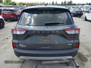 2020 Ford Escape SEL с VIN 1FMCU9H62LUB03461, выставлен на аукционе Copart как лот 62074125 с пробегом 104 462 миль миль и Списание • Salvage title. История ставок и продаж доступна на DreamBid. Изображение 6.