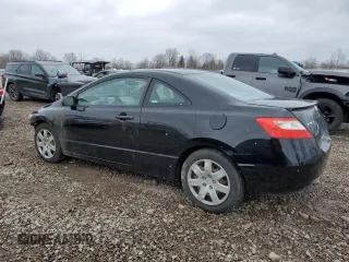 2009 Honda Civic Cpe LX with VIN 2HGFG12659H541892, listed as a Copart auction lot 52978235 with 73,151 mi miles and Salvage Title. Bid and sale history available at carsss.com. Image 2.